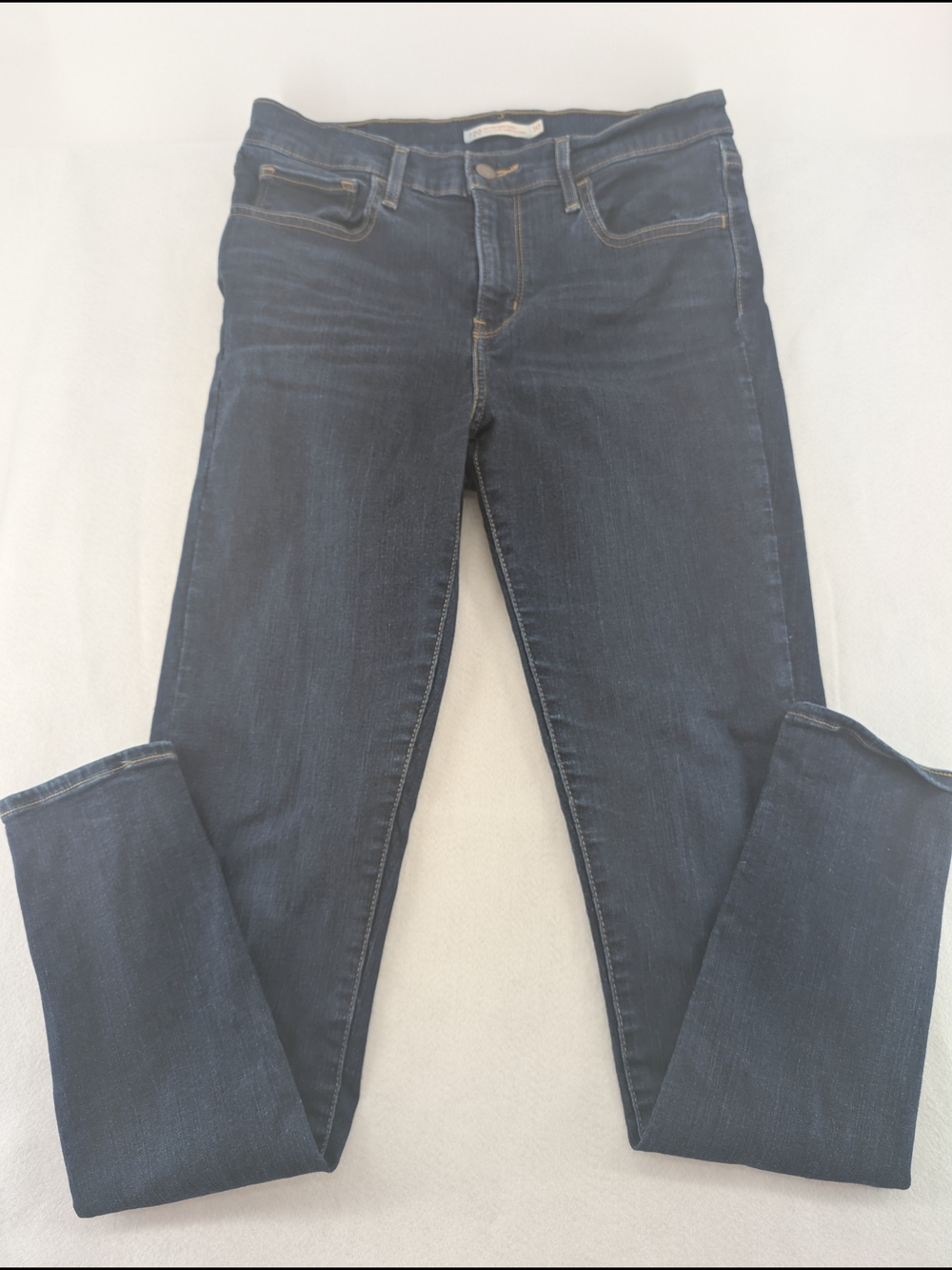 Levi's 311 Shaping Skinny Jeans feature a dark Blue Women's Skinny Jeans